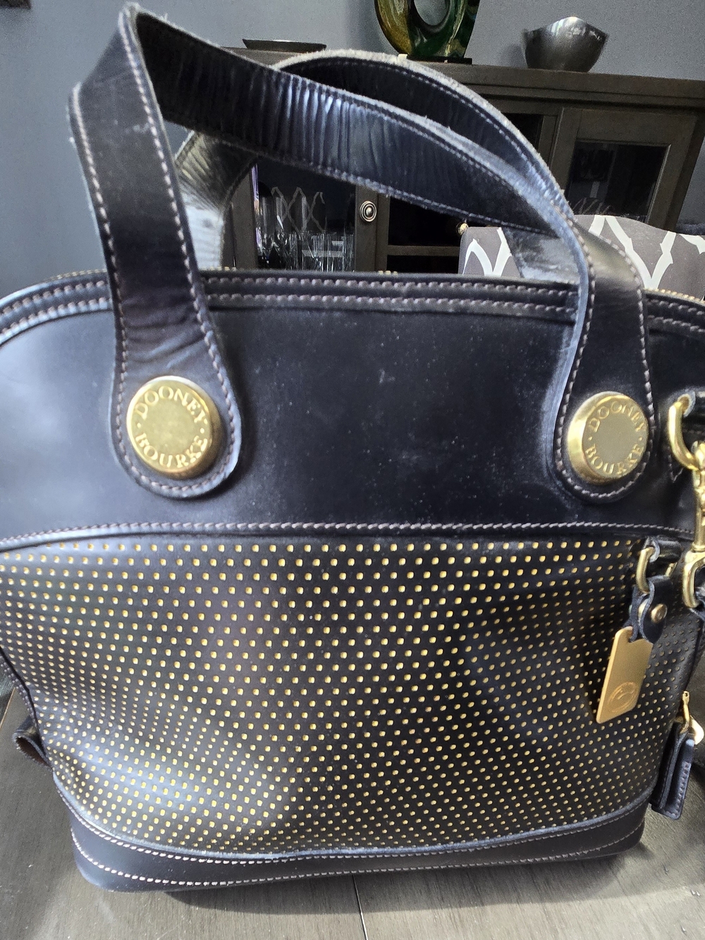 Dooney & Bourke Black Leather Tote with Gold Stud Accent
